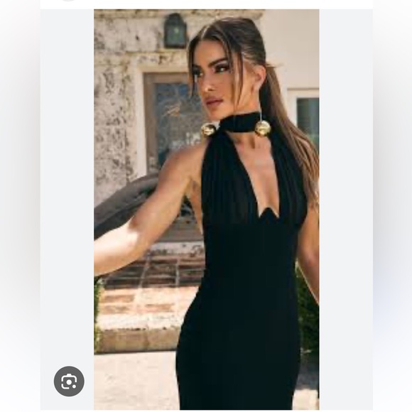 Luzina Midi Dress in Black
Camila Coelho - Picture 4 of 8